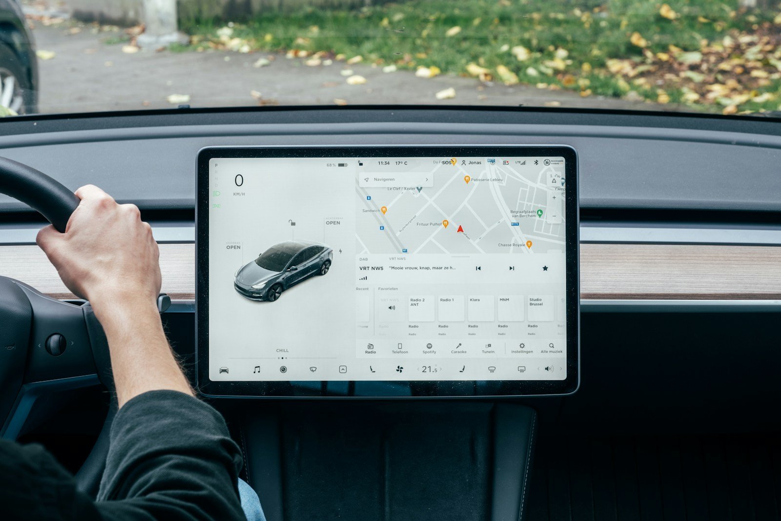 Driver view of a car dashboard and infotainment display