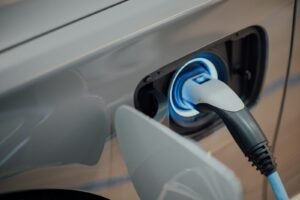 Electric vehicle charging connector plugged into an EV